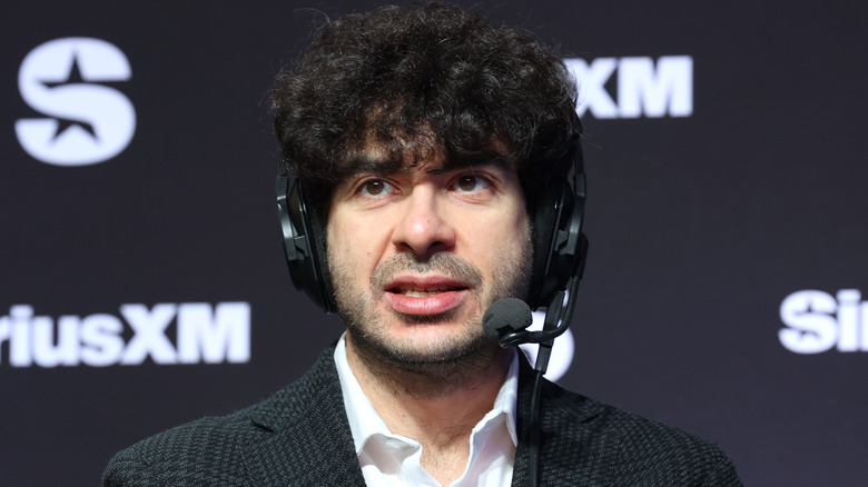 Tony Khan on a headset