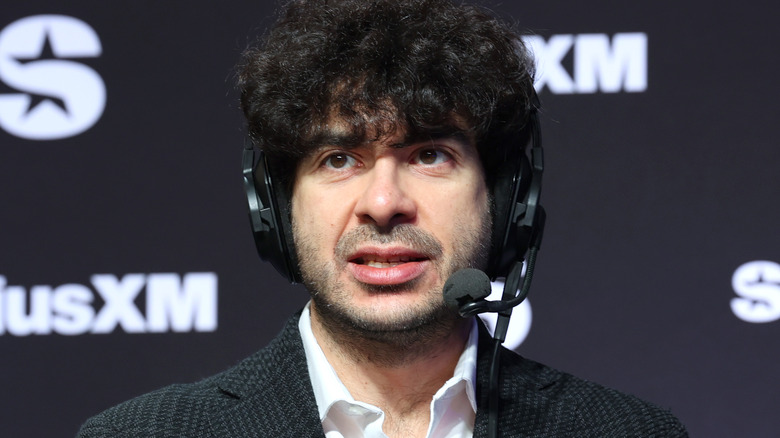 Tony Khan wearing a headset