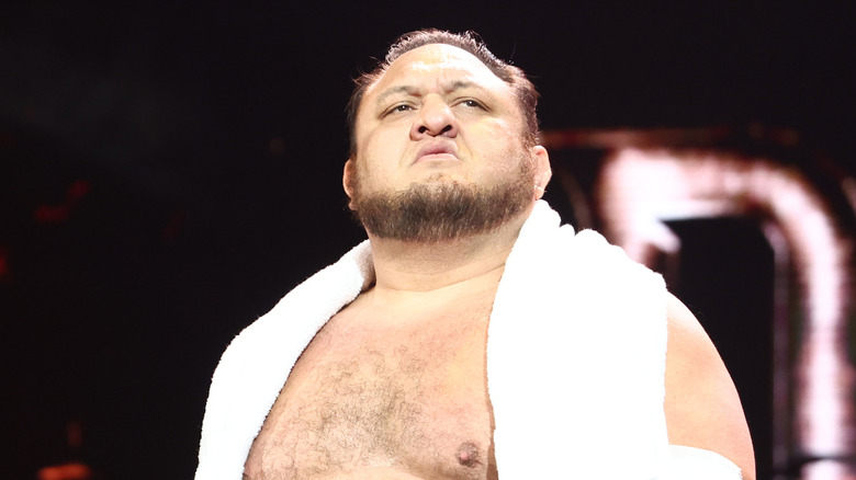 Samoa Joe with his trademark towel on his shoulders