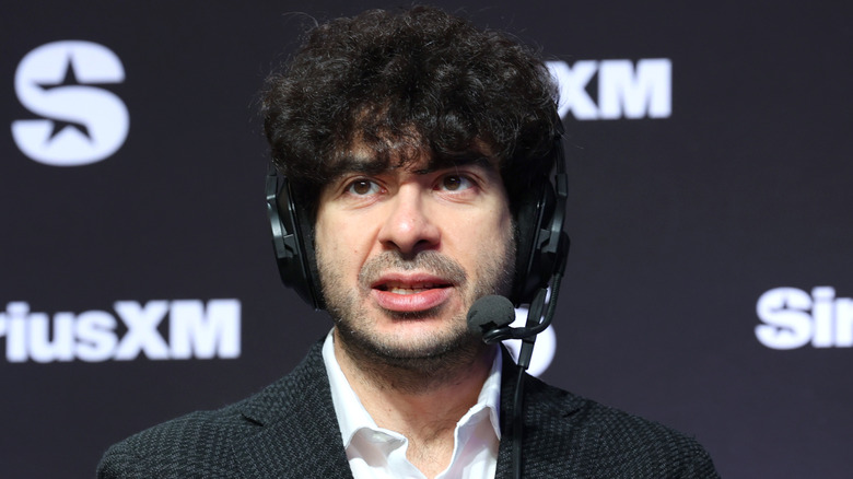 Tony Khan reunited with that headset