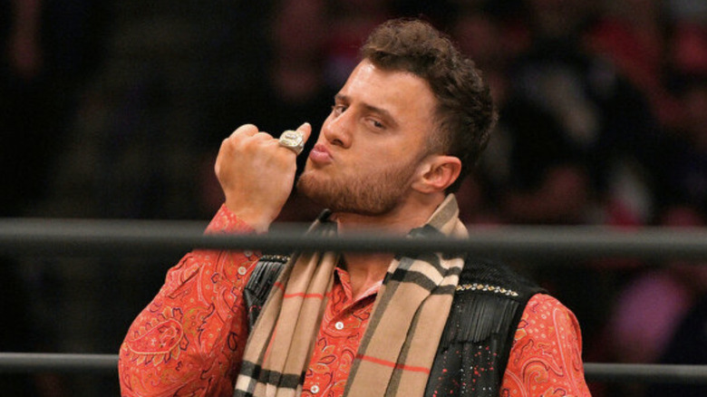 MJF kissing his pinky