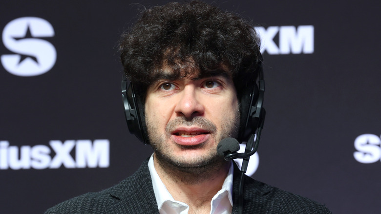 Tony Khan wearing a headset