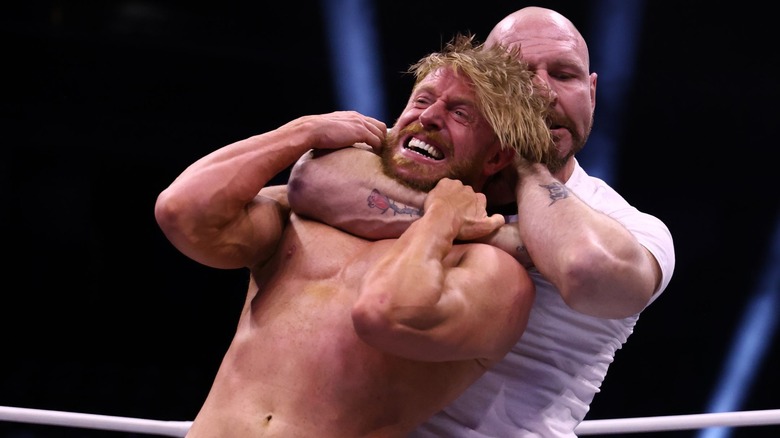 Jon Moxley chokes out Orange Cassidy