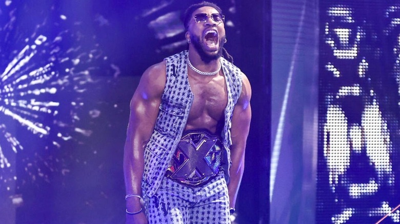 Trick Williams heads down the ramp wearing the NXT Championship before a promo segment on "WWE NXT."