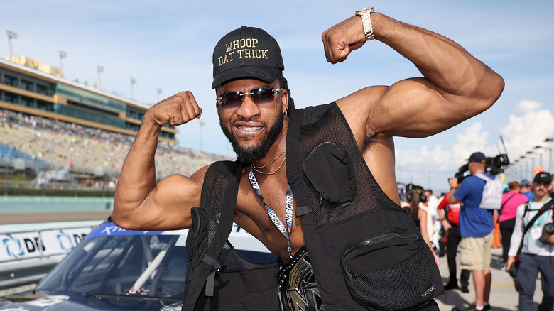 Trick Williams flexes in front of a NASCAR