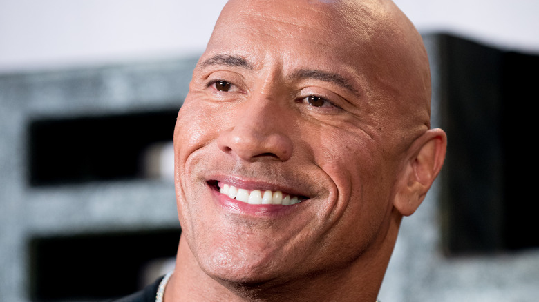 The Rock grinning