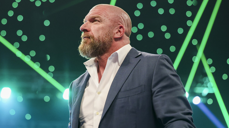 Paul "Triple H" Levesque standing in WWE ring