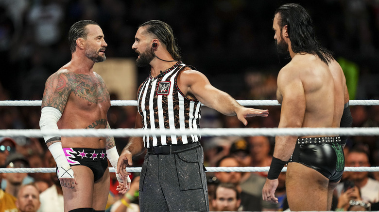 CM Punk, Seth Rollins, and Drew McIntyre at SummerSlam