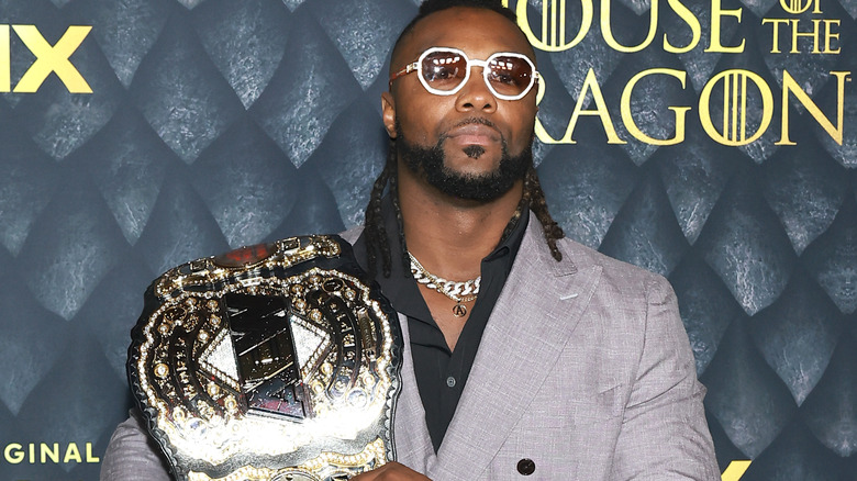 Swerve Strickland poses with AEW Championship