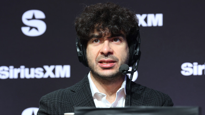 Tony Khan on a headset