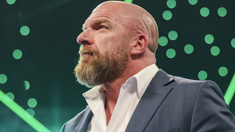 Triple H with green lighting