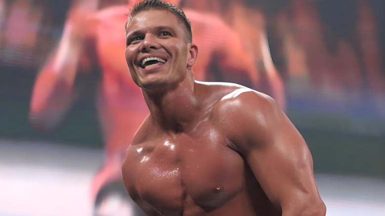 Tyson Kidd posing in the ring 