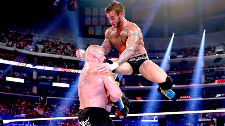 Brock Lesnar and CM Punk at SummerSlam 2013