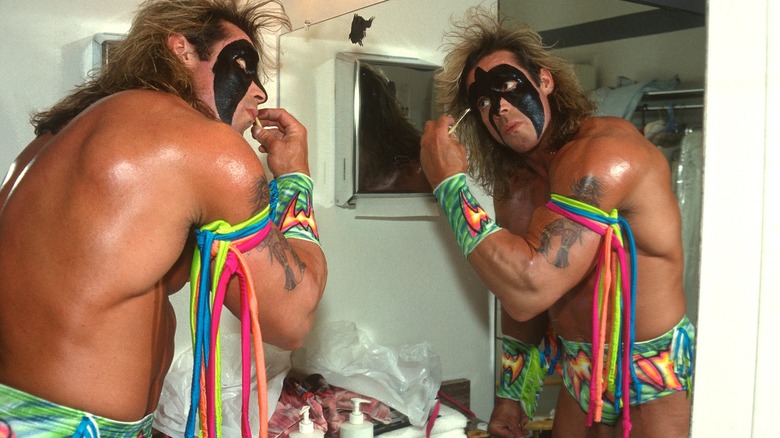 The Ultimate Warrior painting his face