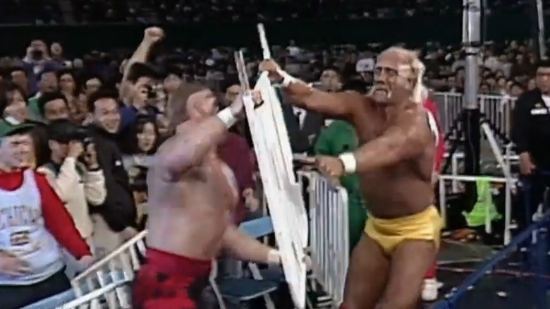 Hulk Hogan Hawk fighting over chair