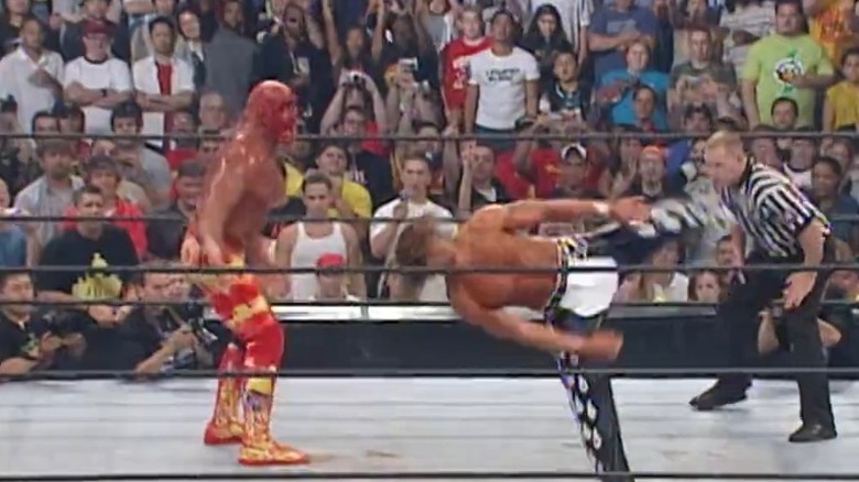 Shawn Michaels bumping Hulk Hogan