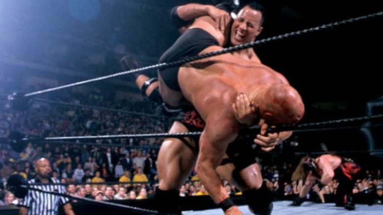The Rock tries to eliminate Stone Cold