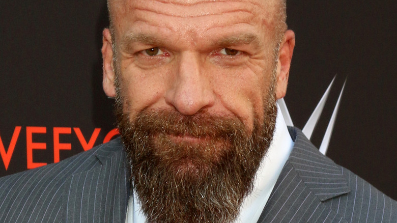 Triple H posing at a promotional event 