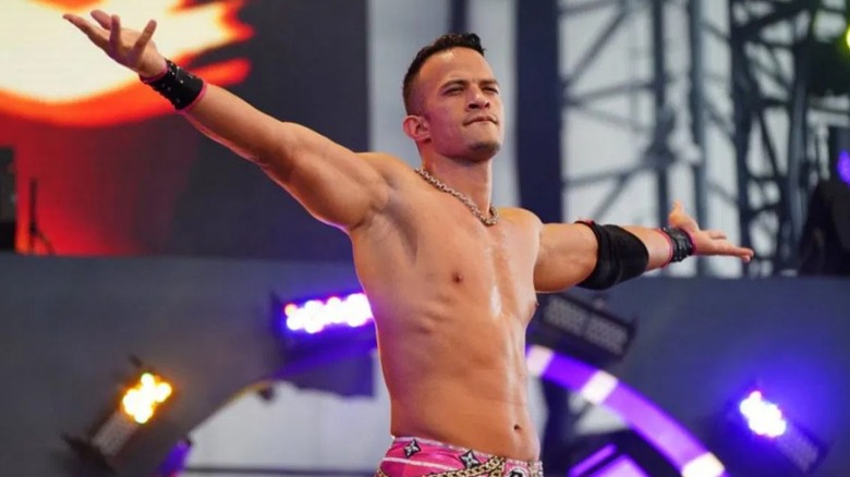 Ricky Starks poses at the top of an AEW entrance ramp after winning a match