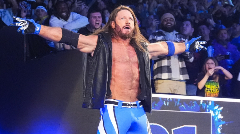 AJ Styles wearing a black vest