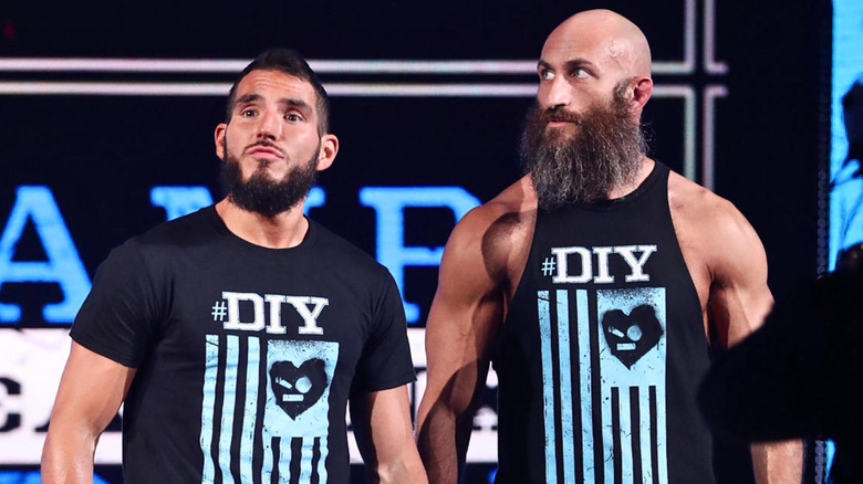 Johnny Gargano and Tommaso Ciampa wearing a DIY shirts