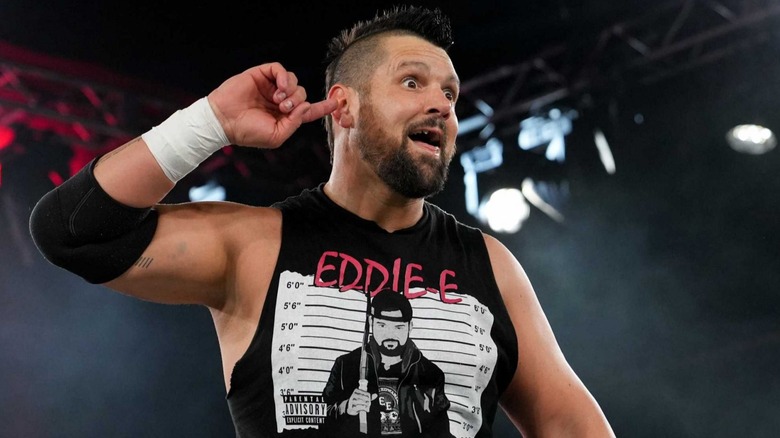 Eddie Edwards riles up the crowd by mocking how he can't hear their boos during a match