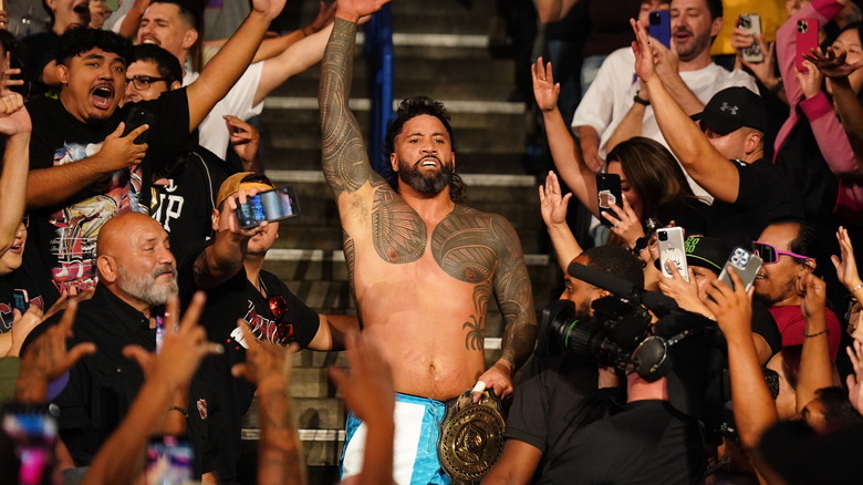 Jey Uso celebrating in crowd