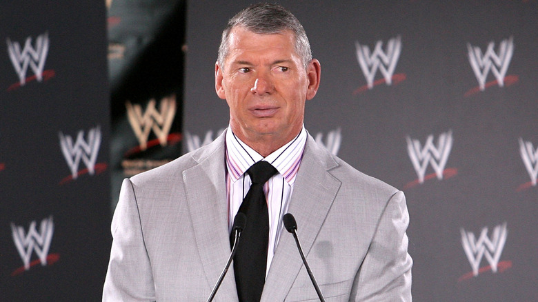 Vince McMahon looks on before making a speech at a WWE press conference event