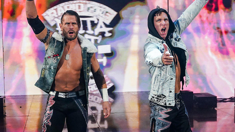 The Motor City Machine Guns posing during their entrance