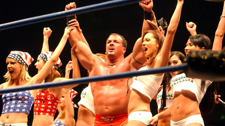 Buff Bagwell poses with many women