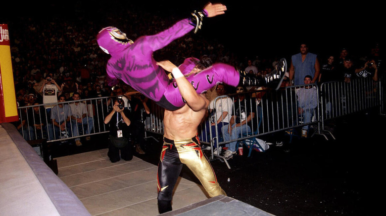 Rey Mysterio delivers a move to Eddie Guerrero at WCW Halloween Havoc 1997.