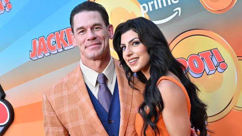 John Cena and Shay Shariatzadeh attend the Los Angeles Premiere of Amazon MGM Studios "Jackpot" at TCL Chinese Theatre on August 13, 2024 in Hollywood, California.