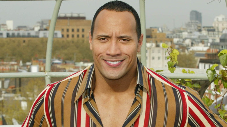 American actor "The Rock" attends a photocall for the movie "The Scorpion King" at the Dorchester Hotel on April 22, 2002 in London.