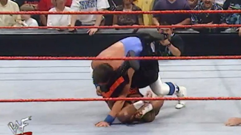 Jerry Lawler rolls up Tazz in the middle of the ring during the shortest match in WWE history.