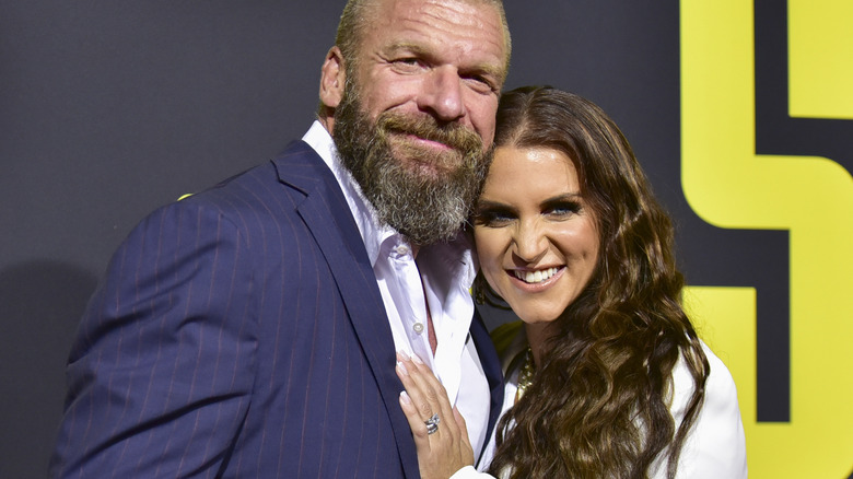 Triple H (L) and Stephanie McMahon attend the premiere of 20th Century Fox's "Stuber" at Regal Cinemas L.A. Live on July 10, 2019 in Los Angeles, California.