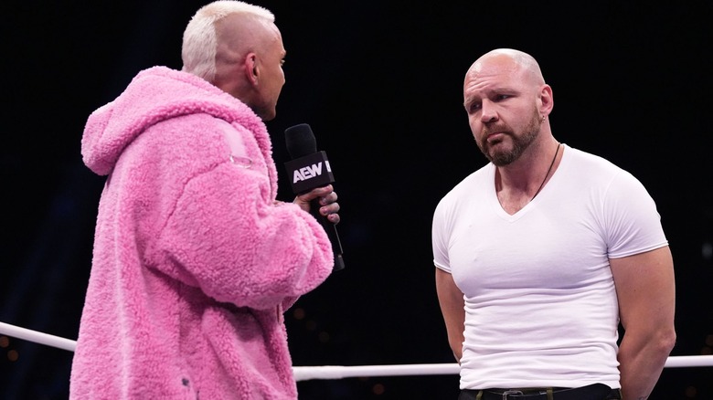 Darby Allin and Jon Moxley standing