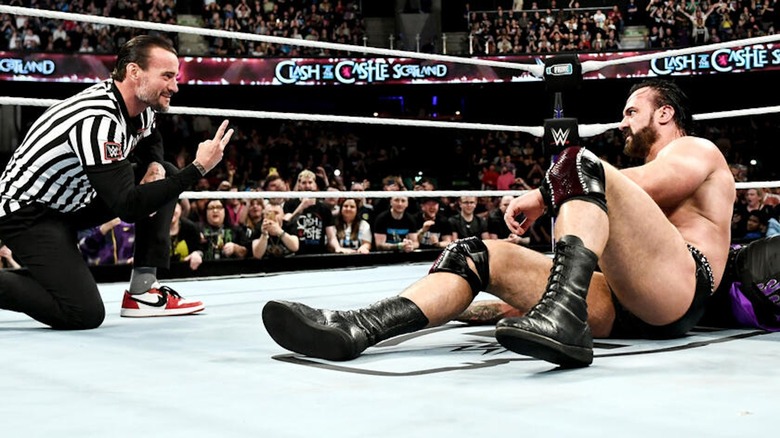 CM Punk shows Drew McIntyre he only counted to two at Clash at the Castle.