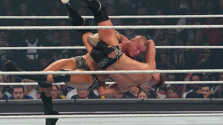 Rand Orton hitting his trademark Powerslam