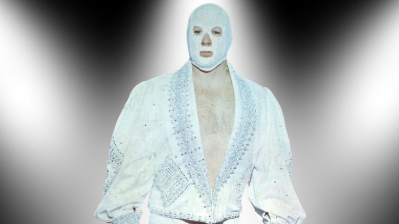 Mr. Wrestling, Tim Woods, poses in his mask and ring jacket backstage for a photoshoot in NWA.