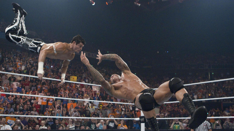 Randy Orton snatches Evan Bourne out of mid-air with an RKO.