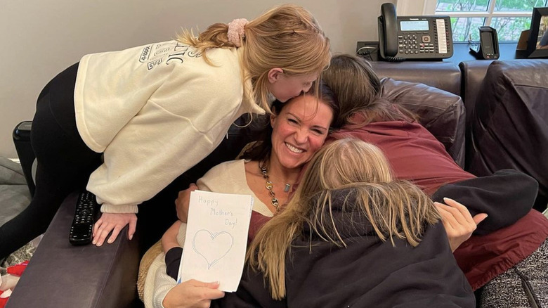 Stephanie McMahon surrounded by her three daughters