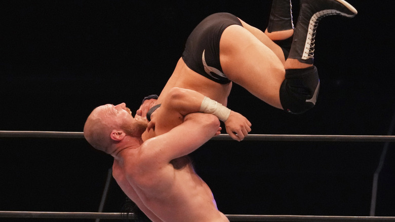 Jon Moxley attempting his variation of the DDT