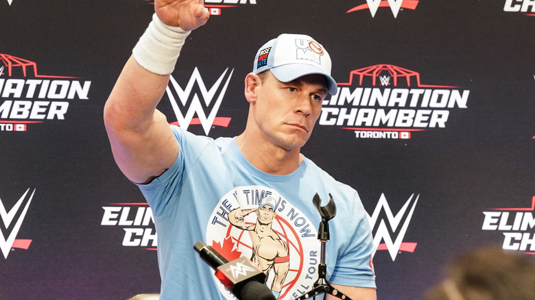 John Cena dropping a microphone