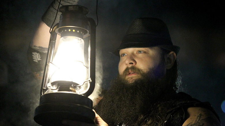 Bray Wyatt blowing out lantern