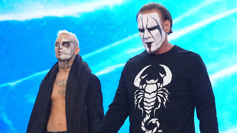 Darby Allin and Sting walk down entrance ramp