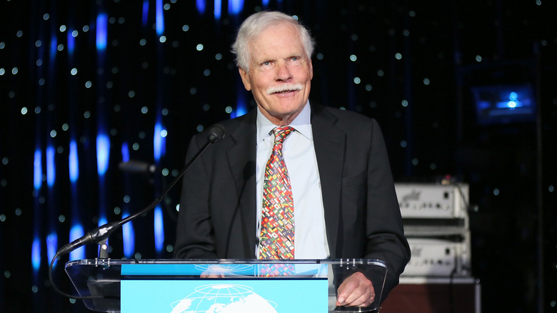 Ted Turner at a lectern