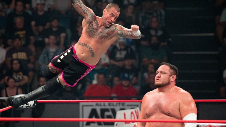 Samoa Joe Evades An Aerial Move From CM Punk