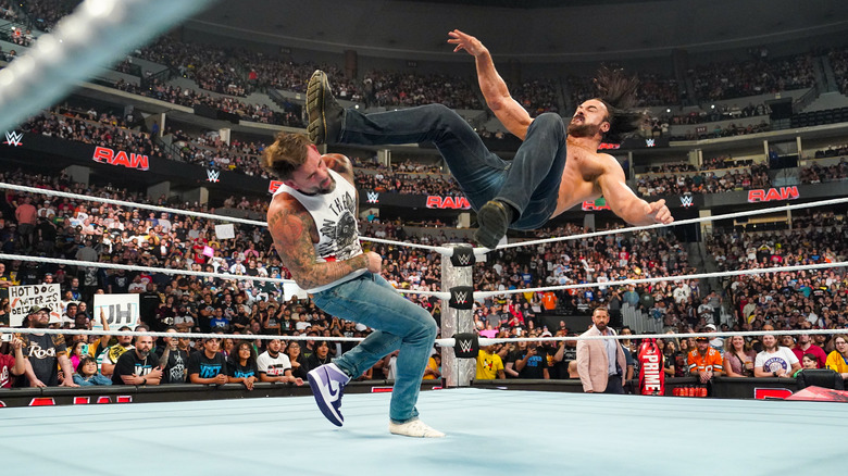 Drew McIntyre kicks CM Punk in the head