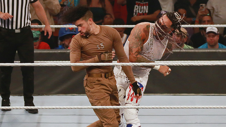 Damian Priest punches Bad Bunny in the ring during their San Juan Street Fight at WWE Backlash.