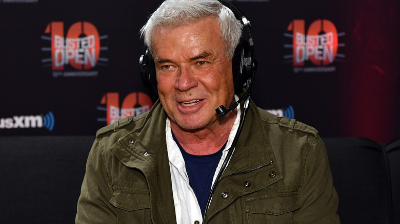 Eric Bischoff smiling and wearing a headset